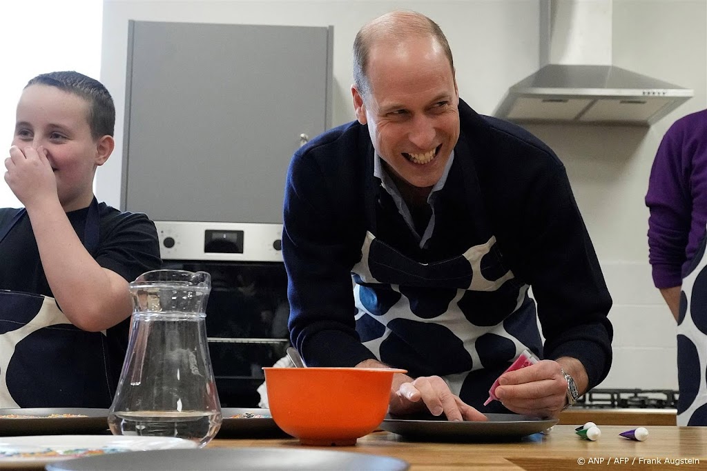 William cooked, exercised and played with children at the center’s opening